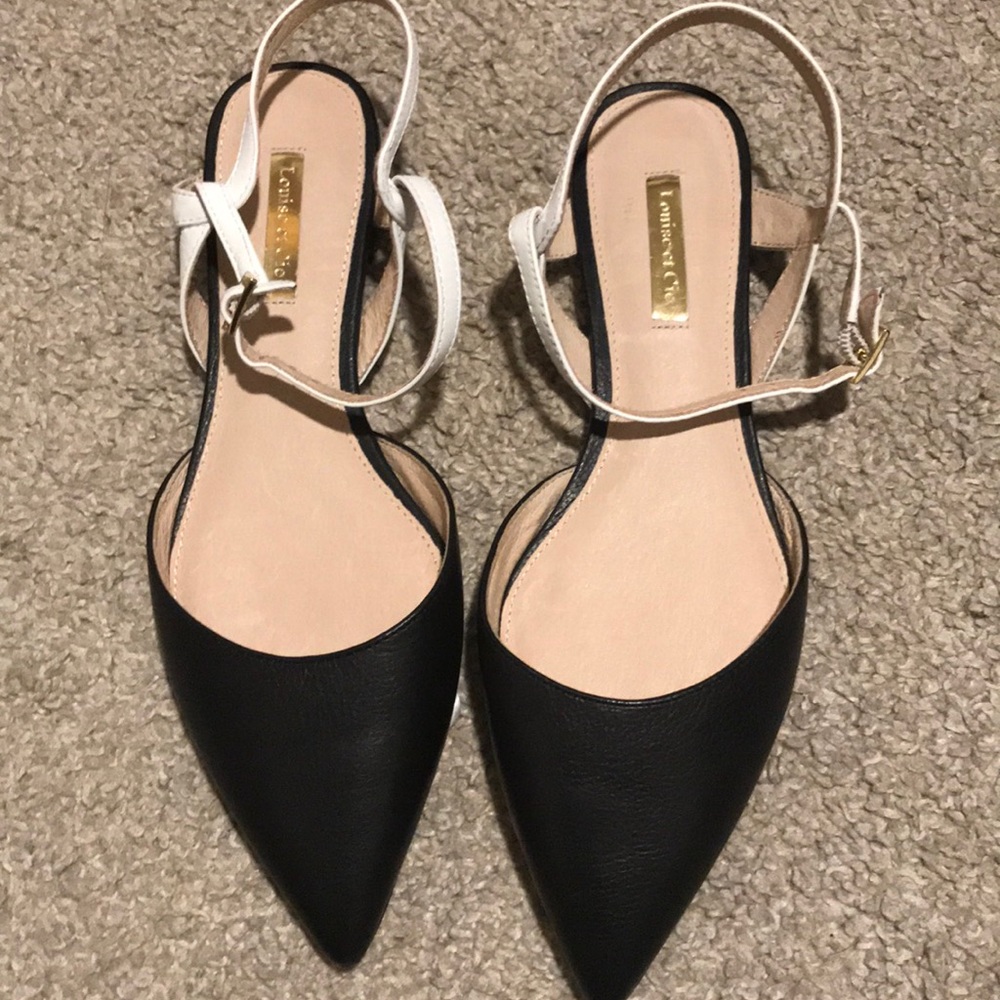 Black and white strapped pointed flats
